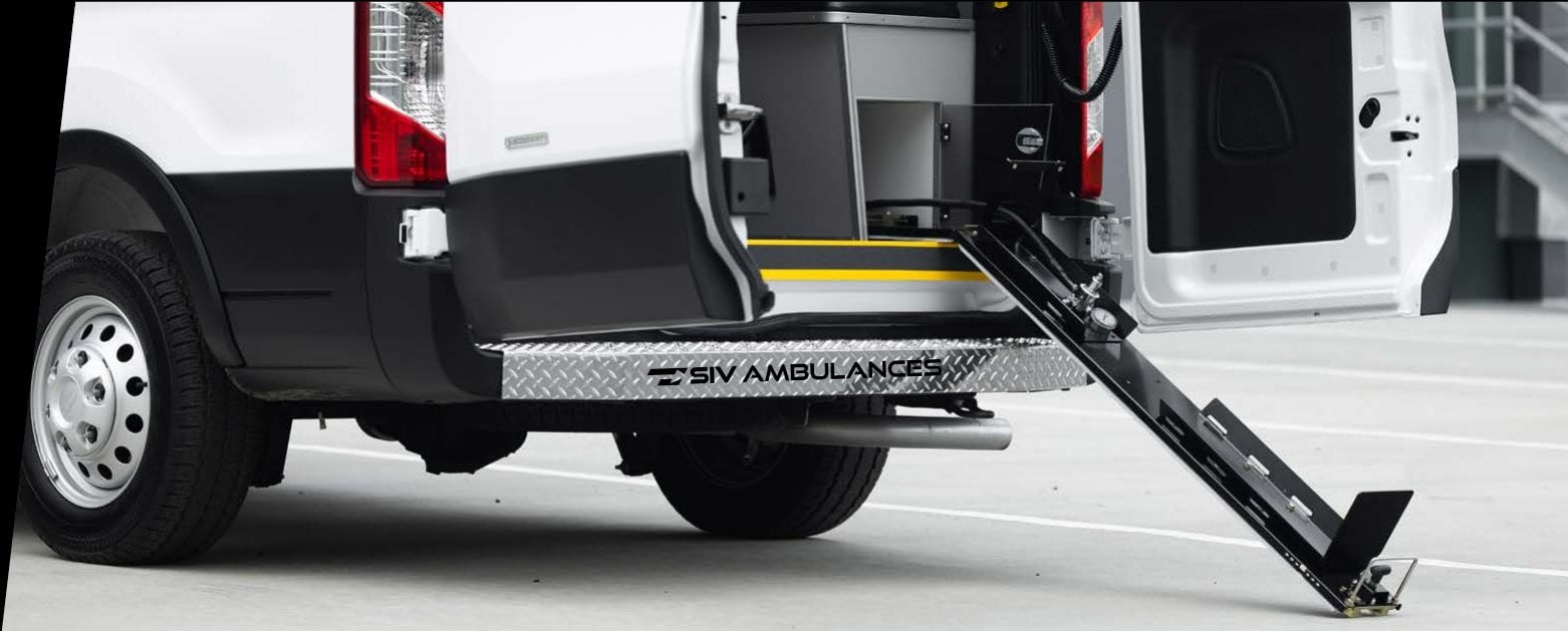 Rear-mounted oxygen cylinder access above the SIV diamond-plate rear bumper